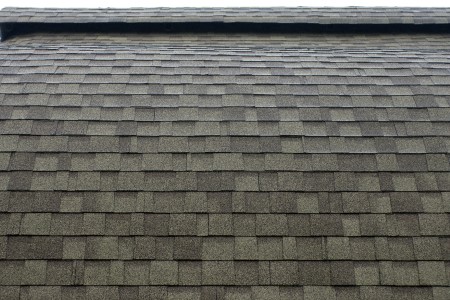 The edge of asphalt shingles in saginaw